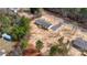 Aerial view of a home with a wooden deck, gravel driveway and freshly mulched yard at 3365 34Th Avenue Ne Ct, Hickory, NC 28601