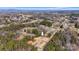 An aerial view of a charming home surrounded by beautiful natural landscape and trees at 3365 34Th Avenue Ne Ct, Hickory, NC 28601