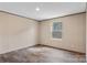 Bright bedroom featuring laminate floors, neutral walls, and window letting in lots of natural light at 3365 34Th Avenue Ne Ct, Hickory, NC 28601