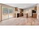 Bright kitchen with wood cabinets, island, and sliding glass doors to the deck at 3365 34Th Avenue Ne Ct, Hickory, NC 28601
