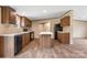 Eat-in kitchen features an island, lots of cabinetry, and stainless-steel appliances at 3365 34Th Avenue Ne Ct, Hickory, NC 28601