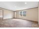 This living room features recessed lighting, neutral paint, and hardwood-look floors at 3365 34Th Avenue Ne Ct, Hickory, NC 28601