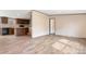 Open-concept space showcases flooring, neutral paint, and views into the kitchen at 3365 34Th Avenue Ne Ct, Hickory, NC 28601