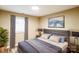 This is a well-lit bedroom featuring hardwood floors, neutral walls and stylish decor at 343 Bell St, Mooresville, NC 28115