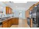 Bright kitchen with wood cabinets, stainless steel appliances and tile flooring at 348 Fleetwood Rd, York, SC 29745