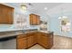 Corner of kitchen with wood cabinets, granite countertops and stainless steel appliances at 348 Fleetwood Rd, York, SC 29745