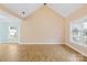 Bright and airy living room with large windows and stylish wood-look flooring at 348 Fleetwood Rd, York, SC 29745