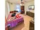 Cozy bedroom featuring hardwood floors, ceiling fan, and natural light at 4073 Lee Cline Rd, Conover, NC 28613