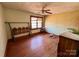Bedroom featuring a window, hardwood floors, and a ceiling fan at 4073 Lee Cline Rd, Conover, NC 28613