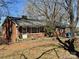 Charming brick home featuring a well-maintained yard and classic design elements at 4073 Lee Cline Rd, Conover, NC 28613