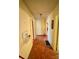 Long hallway featuring wood parquet flooring and a light fixture at 4073 Lee Cline Rd, Conover, NC 28613