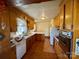 Kitchen area equipped with wood cabinets, laminate countertops, and appliances at 4073 Lee Cline Rd, Conover, NC 28613