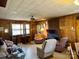 Cozy living area featuring a brick fireplace and ample seating space at 4073 Lee Cline Rd, Conover, NC 28613