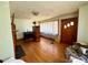 Charming living room with hardwood floors, fireplace, and period details at 4073 Lee Cline Rd, Conover, NC 28613