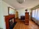 Bright living room featuring a fireplace and original hardwood floors at 4073 Lee Cline Rd, Conover, NC 28613