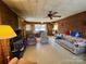 Spacious living area with wood accents, brick fireplace, and lots of natural light at 4073 Lee Cline Rd, Conover, NC 28613