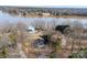 Aerial shot of a lakefront property with mature trees and lush landscaping at 4080 Elks Park Rd, Rock Hill, SC 29732