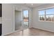 View from indoor porch looking out onto a treelined street in a new community at 419 Burr St, Indian Trail, NC 28079