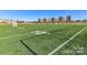 Well-maintained community soccer field with vibrant green turf and clear markings at 419 Burr St, Indian Trail, NC 28079