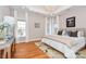 Serene main bedroom boasting bright windows, hardwood floors, and views of the water at 4543 Stonesthrow Dr, Denver, NC 28037