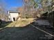 Spacious backyard with detached two-car garage with solar panels at 8730 Rittenhouse Cir, Charlotte, NC 28270