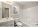 Clean bathroom with a white vanity, and a shower-tub combo at 8730 Rittenhouse Cir, Charlotte, NC 28270