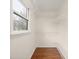 Walk-in closet with window and open white wire shelving at 8730 Rittenhouse Cir, Charlotte, NC 28270