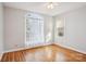 Bright bedroom with hardwood floors and large windows that let in tons of natural light at 912 Silver Charm Ln, York, SC 29745