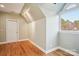 Cozy room featuring wood floors, a dormer window, and neutral walls perfect for relaxing or creative pursuits at 912 Silver Charm Ln, York, SC 29745