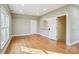 Open bonus room with hardwood floors, multiple windows, and natural light at 912 Silver Charm Ln, York, SC 29745