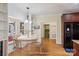 Bright breakfast nook boasting a window seat, built-in shelves, and stylish lighting at 912 Silver Charm Ln, York, SC 29745