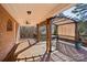 Enjoy this spacious covered deck perfect for outdoor dining and relaxing with great views at 912 Silver Charm Ln, York, SC 29745