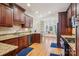 Gourmet kitchen with rich wood cabinets, granite countertops, and an open layout ideal for entertaining at 912 Silver Charm Ln, York, SC 29745