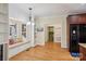 Eat-in kitchen offers custom cabinets, stainless appliances, and a cozy window seat at 912 Silver Charm Ln, York, SC 29745