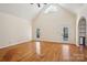 Spacious and airy living room with hardwood floors, vaulted ceiling, and French doors leading to the outdoors at 912 Silver Charm Ln, York, SC 29745