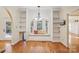 Cozy sitting area with built-in shelves, a window seat and hardwood flooring, creating a relaxing space at 912 Silver Charm Ln, York, SC 29745