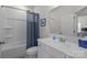Well-lit bathroom featuring a shower-tub combo, modern vanity, and clean finishes at 9804 Ainslie Downs St, Charlotte, NC 28273
