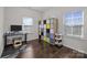 Bright office space with natural light and storage, ideal for a home workspace at 9804 Ainslie Downs St, Charlotte, NC 28273