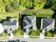 Aerial view of a neighborhood featuring mature trees and well maintained landscaping at 10032 Montrose Nw Dr, Charlotte, NC 28269