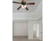 Bedroom featuring a ceiling fan, carpet, and an ensuite bathroom at 10032 Montrose Nw Dr, Charlotte, NC 28269