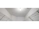 Walk-in closet with white walls and ceiling, along with a wired shelving unit on both sides at 10032 Montrose Nw Dr, Charlotte, NC 28269
