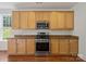Well-equipped kitchen featuring stainless steel appliances and wood cabinetry at 10032 Montrose Nw Dr, Charlotte, NC 28269
