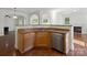 Kitchen area with stainless steel appliances, granite countertops, and open layout at 10032 Montrose Nw Dr, Charlotte, NC 28269