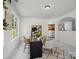 Bright office area with marble floors and view of kitchen at 10032 Montrose Nw Dr, Charlotte, NC 28269