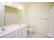 Bathroom featuring double sink vanity with white cabinets and modern fixtures at 10034 Bishops Gate Blvd, Pineville, NC 28134