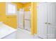 Vibrant bathroom featuring a modern glass-enclosed shower and double sinks for convenience at 10034 Bishops Gate Blvd, Pineville, NC 28134