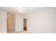 Bedroom with neutral walls, fan, carpet and two doorways, creating an open, airy feel at 10034 Bishops Gate Blvd, Pineville, NC 28134