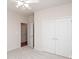 Neutral bedroom with ceiling fan, closet and white trim at 10034 Bishops Gate Blvd, Pineville, NC 28134