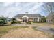 Charming clubhouse featuring a welcoming entrance and beautifully landscaped surroundings at 10034 Bishops Gate Blvd, Pineville, NC 28134