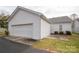 Exterior view of the home's two car garage at 10034 Bishops Gate Blvd, Pineville, NC 28134